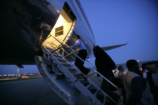 President George W. Bush boards Air Force One at Andrews Air Force Base Monday night, June 12, 2006, en route to Iraq. White House photo by Eric Draper