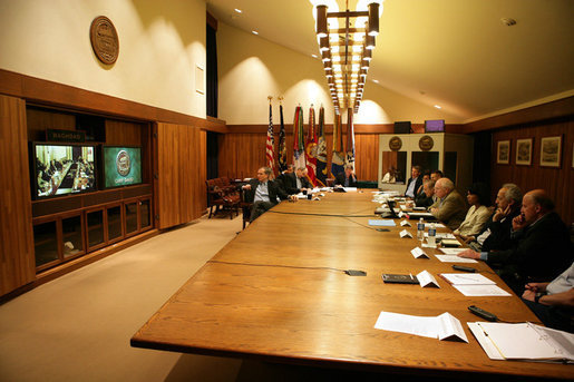 From Camp David, Md., Vice President Dick Cheney and members of the Interagency Team on Iraq participate in a video teleconference with President George W. Bush in Baghdad, Tuesday, June 13, 2006. White House photo by David Bohrer