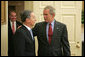 President George W. Bush welcomes Colombian President Alvaro Uribe to the Oval Office Wednesday, June 14, 2006. White House photo by Paul Morse