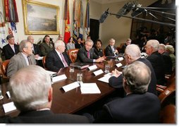 President George W. Bush, is joined by Vice President Dick Cheney, Defense Secretary Donald Rumsfeld, left, and Secretary of State Condoleezza Rice, right, as he addresses members of the Iraq Study Group Wednesday, June 14, 2006 in the Roosevelt Room at the White House, thanking the bipartisan group for their willingness to provide advice to the administration on Iraq. White House photo by Kimberlee Hewitt