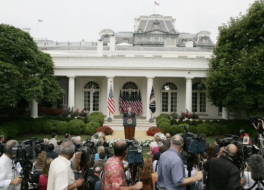 President George W. Bush talks with members of the media Wednesday morning, June 14, 2006, during a news conference in the Rose Garden, following his trip to Iraq where he met with members of the Iraq government and U.S. troops. White House photo by Kimberlee Hewitt