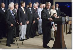 President George W. Bush speaks during the signing of S. 2803, The MINER Act, in the Dwight D. Eisenhower Executive Office Building Thursday, June 15, 2006."We honor the memory of all lost miners today; that's what we're doing signing this bill. We make this promise to American miners and their families: We'll do everything possible to prevent mine accidents and make sure you're able to return safely to your loved ones," said President Bush. White House photo by Eric Draper