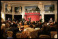 President George W. Bush addresses the Initiative for Global Development's 2006 National Summit in Washington, D.C., Thursday, June 15, 2006. A partnership between business and civic leaders, the initiative works to reduce global poverty. White House photo by Kimberlee Hewitt