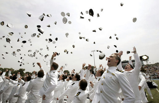 Graduates celebrate during their graduation ceremony at the United States Merchant Marine Academy at Kings Point, New York, Monday, June 19, 2006. White House photo by Kimberlee Hewitt