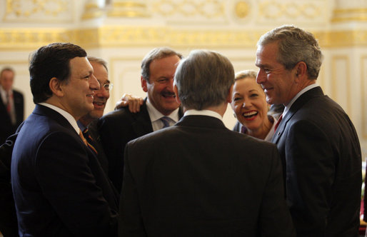 President George W. Bush looks at Austria's Chancellor Wolfgang Schuessel, back to camera, as they gather with leaders of the European Union Wednesday, June 21, 2006, in Vienna. From left are: EU President Jose Manuel Barroso; EU Secretary-General Javier Solana; Austria's Vice Chancellor Hubert Gorbach; Chancellor Schuessel; Benita Ferrero-Waldner, EU Commissioner for External Affairs, and President Bush. White House photo by Eric Draper