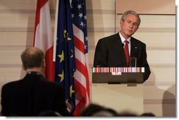 President George W. Bush listens as he receives a question from the media during a press availability Wednesday, June 21, 2006, during the U.S.-EU Summit in Vienna. White House photo by Paul Morse