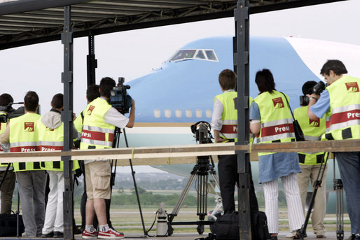 Members of the media cover the arrival in Budapest Wednesday, June 21, 2006, of President George W. Bush aboard Air Force One. White House photo by Paul Morse