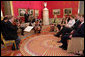 Mrs. Laura Bush listens to a concert by members of the Vienna Philharmonic at the Albertina Museum in Vienna, Austria, Wednesday, June 21, 2006, where she was also given a tour of the museum. White House photo by Shealah Craighead