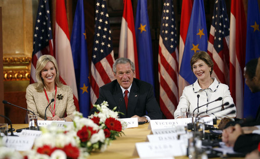 President George W. Bush and Laura Bush are joined by U.S. Ambassador to Austria Susan McCaw during a roundtable discussion Wednesday, June 21, 2006, with foreign students at the National Library in Vienna. White House photo by Eric Draper