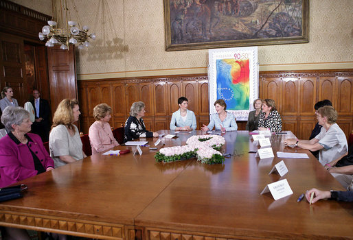 Mrs. Laura Bush and Dr. Klara Dobrev, wife of Hungarian Prime Minister Ferenc Gyurcsanys, participate in a roundtable discussion about breast cancer awareness in Budapest, Hungary, Thursday, June 22, 2006. White House photo by Shealah Craighead