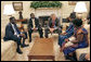 President George W. Bush meets with the National Endowment for Democracy award recipients in the Oval Office Tuesday, June 27, 2006. From left, they are Alfred Taban of Sudan, Dr. Reginald Matchaba-Hove of Zimbabwe, Immaculee Birhaheka of the Democratic Republic of the Congo and Zainab Hawa Bangura of Sierra Leone. White House photo by Kimberlee Hewitt