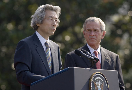 Prime Minister Junichiro Koizumi of Japan speaks during the arrival ceremony on the South Lawn Thursday, June 29, 2006. "I sincerely hope that my visit this time will enable our two countries to continue to cooperate and double-up together, and as allies in the international community make even greater contributions to the numerous challenges in the world community," White House photo by Paul Morse