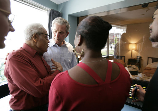 President George W. Bush stands with his arm around Dr. Benjamin Hooks, Memphis resident and former director of the NAACP, during a tour Friday, June 30, 2006, of the National Civil Rights Museum in Memphis. Joining them is Gwen Harmon, marketing director of the museum that is built around the Lorraine Motel, site of the 1968 assassination of civil rights leader Dr. Martin Luther King, Jr. The stop came during a visit to Memphis by the President with Prime Minister Junichiro Koizumi of Japan. White House photo by Eric Draper