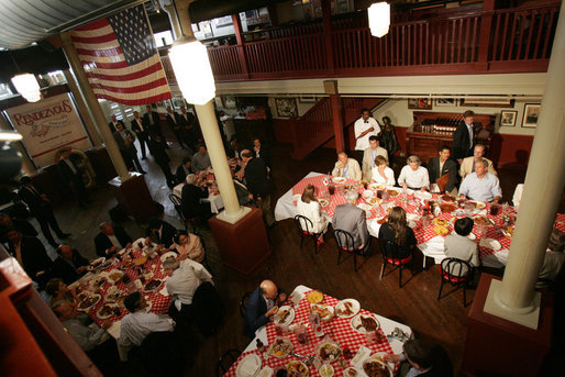 President George W. Bush, Laura Bush, and Japanese Prime Minister Junichiro Koizumi sit down for a bar-b-que lunch at Rendezvous restaurant, Friday, June 30, 2006, in Memphis, Tennessee, after taking a tour of Graceland and visiting the National Civil Rights Museum. White House photo by Shealah Craighead