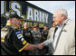 Vice President Dick Cheney meets members of the U.S. ARMY NASCAR racing team Saturday, July 1, 2006, while attending the 2006 Pepsi 400 NASCAR race at Daytona International Speedway in Daytona, Fla. White House photo by David Bohrer