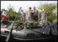 President George W. Bush is shown a fully-equipped combat raiding craft Tuesday, July 4, 2006, during his Independence Day visit to Fort Bragg in North Carolina, where he addressed troops and met with the U.S. Army Special Operations Command. White House photo by Paul Morse