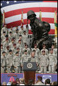 President George W. Bush addresses his remarks to U.S. troops and their family members Tuesday, July 4, 2006, during an Independence Day celebration at Fort Bragg in North Carolina. President Bush thanked the troops and their families for their service to the nation. White House photo by Paul Morse