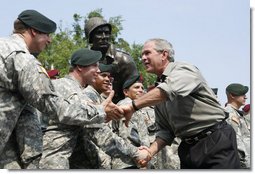 President George W. Bush meets U.S. Airborne and Special Forces troops following his remarks Tuesday, July 4, 2006, during an Independence Day celebration at Fort Bragg in North Carolina. President Bush thanked the troops and their families for their service to the nation. White House photo by Paul Morse