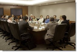 Mrs. Laura Bush, participates in the U.S. Afghan Women's Council meeting at the State Department, Wednesday, July 5, 2006, in Washington, D.C. The Council meets twice a year, alternating between Kabul and Washington, to discuss programs for assisting Afghan women in gaining skills and education that they were denied under years of Taliban rule.  White House photo by Shealah Craighead