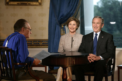 President George W. Bush and Laura Bush join CNN’s Larry King at an interview Thursday, July 6, 2006 in the Blue Room at the White House. White House photo by Eric Draper