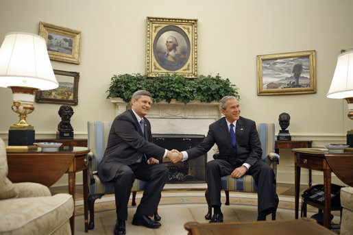 President George W. Bush meets with Canadian Prime Minister Stephen Harper in the Oval Office Thursday, July 6, 2006. White House photo by Paul Morse