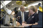 President George W. Bush visits with an employee during a tour of the Allen-Edmonds Shoe Corporation in Port Washington, Wis., Tuesday, July 11, 2006. White House photo by Kimberlee Hewitt