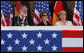 Mrs. Laura Bush is seated between Stralsund Mayor Harald Lastovka and German Chancellor Angela Merkel during the welcoming ceremony Thursday, July 13, 2006, in honor of the visit by President George W. Bush and Laura Bush to Stralsund, Germany. White House photo by Eric Draper