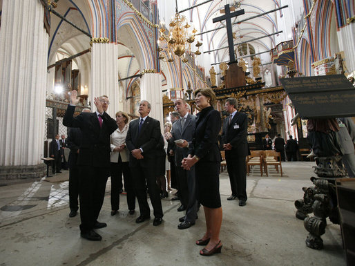 German Chancellor Angela Merkel, President George W. Bush and Laura Bush tour St. Nikolai Church in Stralsund, Germany, Thursday, July 13, 2006. White House photo by Eric Draper