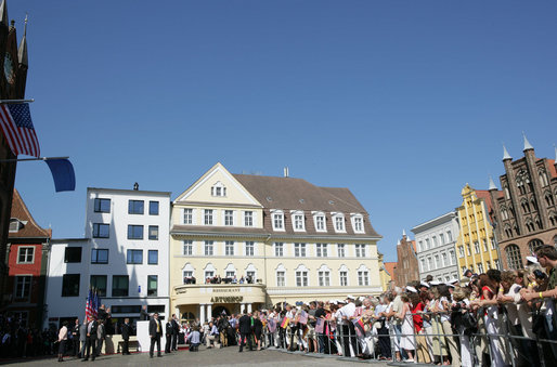 President George W. Bush addresses the crowded town square of Stralsund, Germany, before meeting with Chancellor Angela Merkel Thursday, July 13, 2006. "I bring a message from the American people: We're honored to call the German people friends and allies," said President Bush. "We share common values and common interests. We want to work together to keep the peace. We want to work together to promote freedom. There's so much that we can do, working together, and that's -- part of my visit today is to pledge to you and the Chancellor, America and Germany stand side-by-side." White House photo by Shealah Craighead