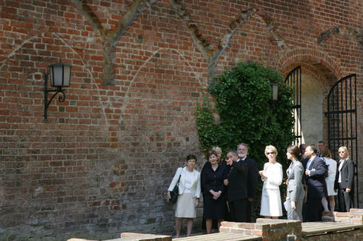 Mrs. Laura Bush is escorted on a tour outside the City of Stralsund Archives in Stralsund, Germany, Thursday, July 13, 2006, by Dr. Hans-Joachim Hacker, director of the City of Stralsund Archives. White House photo by Shealah Craighead