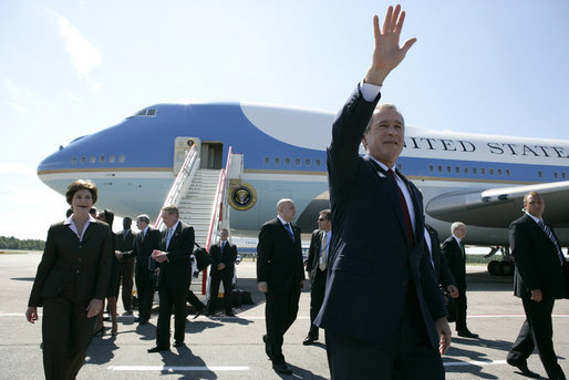 President George W. Bush and Laura Bush arrive Friday, July 14, 2006, to St. Peterburg’s Pulkovo Airport, waving to well-wishers waiting to greet them.President Bush will attend the G8 Summit over the weekend. White House photo by Eric Draper