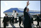 President George W. Bush and Laura Bush arrive Friday, July 14, 2006, to St. Peterburg’s Pulkovo Airport, waving to well-wishers waiting to greet them.President Bush will attend the G8 Summit over the weekend. White House photo by Eric Draper