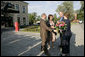 President George W. Bush and Laura Bush are greeted by Russian President Vladimir Putin and his wife, Lyudmila, upon their arrival Friday, July 14, 2006, for a social dinner at the Konstantinovsky Palace in Strelna, Russia. White House photo by Eric Draper