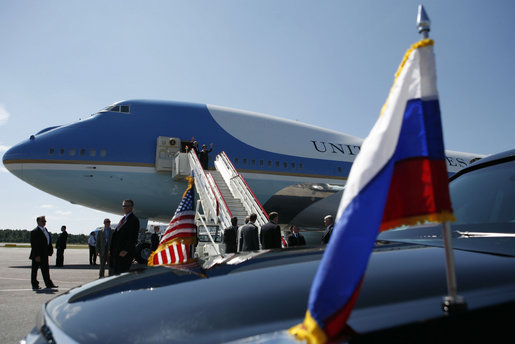 President George W. Bush and Mrs. Laura Bush wave from Air Force One upon arriving at Pulkovo International Airport for the upcoming G8 Summit in St. Petersburg, Russia, Friday, July 14, 2006. White House photo by Paul Morse