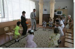 Mrs. Laura Bush dances with youngsters Friday, July 14, 2006, at the Pediatric HIV/AIDS Clinical Center of Russia in St. Petersburg, Russia.  White House photo by Shealah Craighead