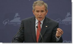 President George W. Bush emphasizes a point as he responds to a question Saturday, July 15, 2006, during a joint press availability with President Vladimir Putin of Russia at the International Media Center on the grounds of the Konstantinovsky Palace Complex, site of the G8 Summit in Strelna, Russia. White House photo by Paul Morse