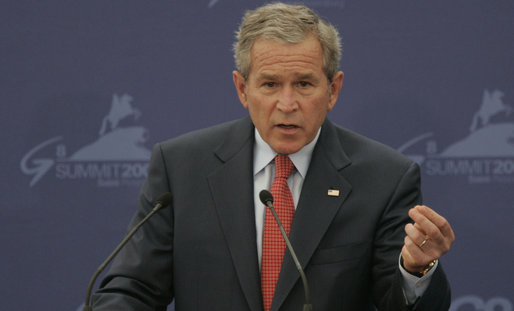 President George W. Bush emphasizes a point as he responds to a question Saturday, July 15, 2006, during a joint press availability with President Vladimir Putin of Russia at the International Media Center on the grounds of the Konstantinovsky Palace Complex, site of the G8 Summit in Strelna, Russia. White House photo by Paul Morse