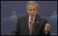 President George W. Bush emphasizes a point as he responds to a question Saturday, July 15, 2006, during a joint press availability with President Vladimir Putin of Russia at the International Media Center on the grounds of the Konstantinovsky Palace Complex, site of the G8 Summit in Strelna, Russia. White House photo by Paul Morse