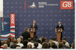 President George W. Bush and President Vladimir Putin of Russia, answer questions from reporters during a joint press availability at the International Media Center at the Konstantinovsky Palace Complex in Strelna, Russia, site of the 2006 G8 Summit. White House photo by Paul Morse