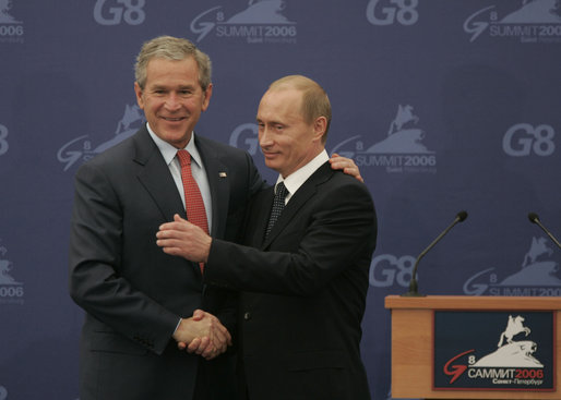 President George W. Bush and President Vladimir Putin exchange handshakes Saturday, July 15, 2006, after a joint press availability at the International Media Center in the Konstantinovsky Palace Complex, site of the G8 Summit in Strelna, Russia. White House photo by Paul Morse