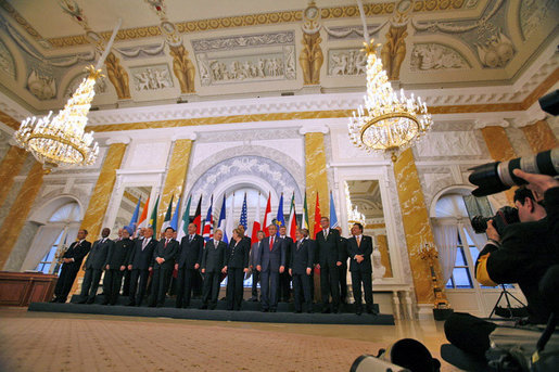 President George W. Bush poses with fellow G8 leaders, invited leaders and heads of international organizations for a group photograph at Konstantinvosky Palace in Strelna, Russia, Monday, July 17, 2006. White House photo by Paul Morse