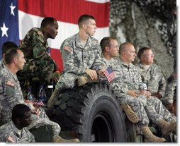 Soldiers from the Iowa Air and Army National Guard listen as Vice President Dick Cheney delivers remarks, Monday, July 17, 2006, at Camp Dodge in Johnston, Iowa. Camp Dodge, home of the National Maintenance Training Center, trains all of the Army, Army National Guard and Army Reserve maintenance companies in the United States. White House photo by David Bohrer