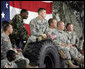 Soldiers from the Iowa Air and Army National Guard listen as Vice President Dick Cheney delivers remarks, Monday, July 17, 2006, at Camp Dodge in Johnston, Iowa. Camp Dodge, home of the National Maintenance Training Center, trains all of the Army, Army National Guard and Army Reserve maintenance companies in the United States. White House photo by David Bohrer