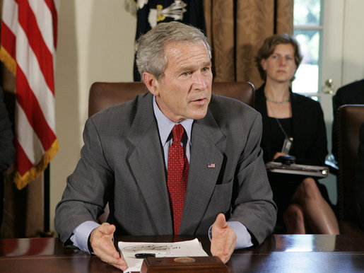 President George W. Bush answers a reporter's question Tuesday, July 18. 2006, in the Cabinet Room at the White House, about ongoing events in the Middle East, during President Bush's meeting with bipartisan members of Congress about his trip to the G8 Summit. White House photo by Kimberlee Hewitt