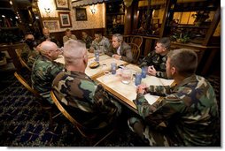 President George W. Bush meets with U.S.military service personnel who have recently returned from duty in Iraq and Afghanistan to hear about their experiences Friday, July 21, 2006, at Tamale Fiesta Kitchen restaurant in Aurora, Colorado. White House photo by Eric Draper