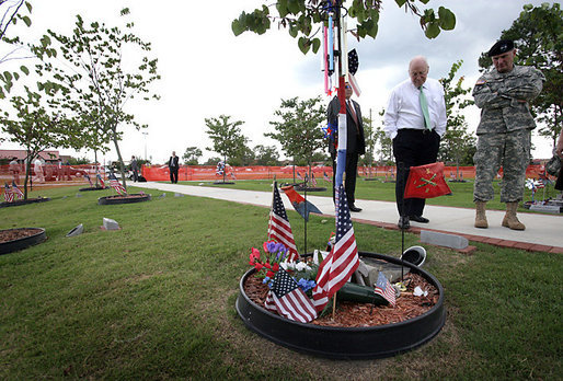 Vice President Dick Cheney tours the “Warriors Walk,” a living memorial of Eastern Redbud trees dedicated to the fallen soldiers assigned to the 3rd Infantry Division who served in Operation Iraqi Freedom, as part of his visit to Fort Stewart, Ga., Friday, July 21, 2006. White House photo by David Bohrer