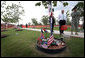 Vice President Dick Cheney tours the “Warriors Walk,” a living memorial of Eastern Redbud trees dedicated to the fallen soldiers assigned to the 3rd Infantry Division who served in Operation Iraqi Freedom, as part of his visit to Fort Stewart, Ga., Friday, July 21, 2006. White House photo by David Bohrer