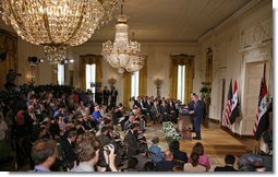 President George W. Bush and Iraqi Prime Minister Nouri al-Maliki hold a joint press conference in the East Room Tuesday, July 25, 2006. "We are determined to defeat terrorism, and the security plan for Baghdad has entered the second phase and it's achieving its objectives in hunting the terrorist networks and eliminating it," said the Prime Minister in his remarks.  White House photo by Paul Morse