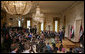 President George W. Bush and Iraqi Prime Minister Nouri al-Maliki hold a joint press conference in the East Room Tuesday, July 25, 2006. "We are determined to defeat terrorism, and the security plan for Baghdad has entered the second phase and it's achieving its objectives in hunting the terrorist networks and eliminating it," said the Prime Minister in his remarks. White House photo by Paul Morse