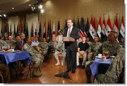 President George W. Bush listens as Iraqi Prime Minister Nouri al-Maliki speaks to military personnel and their families during his visit to Fort Belvoir, Va., Wednesday, July 26, 2006.  White House photo by Paul Morse